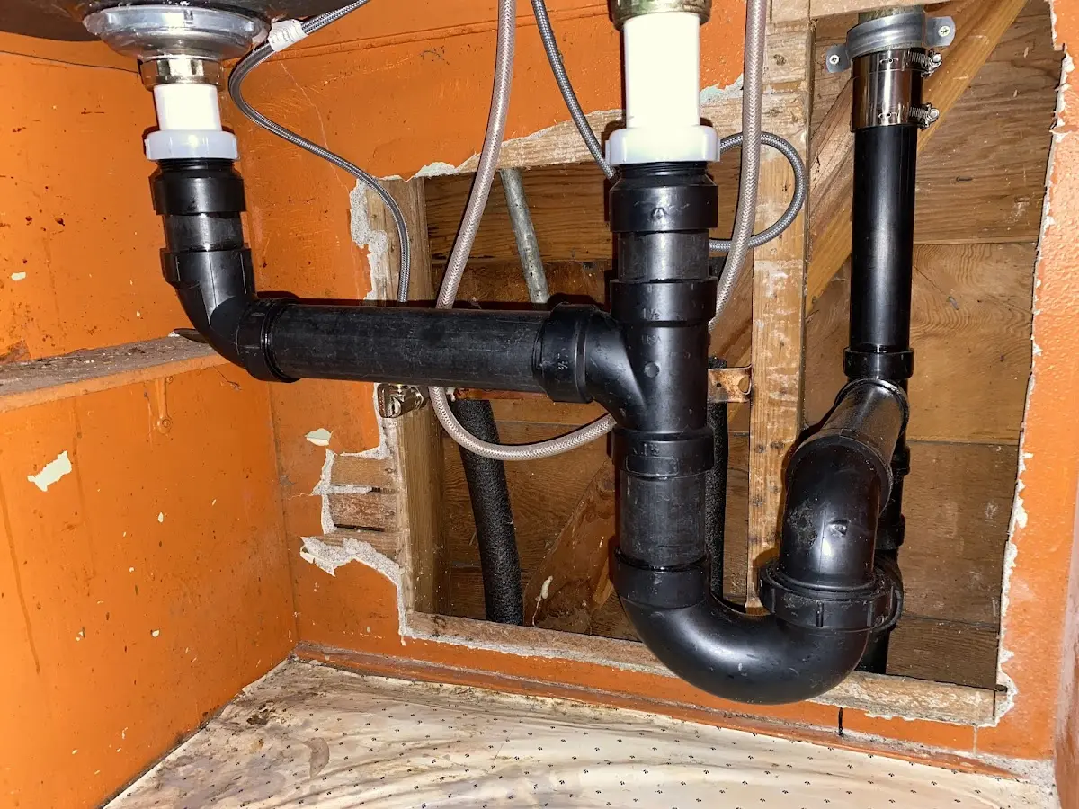 Professional Garbage Disposal Repair equipment and tools on the job in Delano